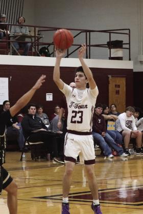 Zaiden Jalomo shoots over the defender
