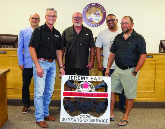 City Council presented Jeremy Earl with as sign in recognition of 30 years of service to the Tulia Fire Department. Pictured are Robert Bazemore, Dusty George, Jed Owens, Bibo Ramirez, and Jeremy Earl.