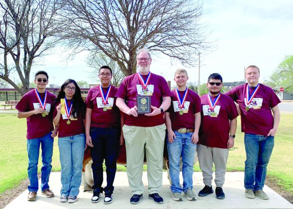 HHS Current Events team, left to right – Eduardo Martinez, Carol Martinez, Daniel Moreno, Coach Richard LaMascus, Johan Grotegut, Bryan Tovar, and Josef Grotegut.