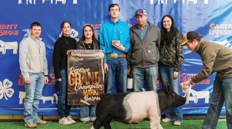 Zac Huseman is pictured with his Reserve Grand Champion Market Barrow at this year's Castro County Junior Livestock Show.
