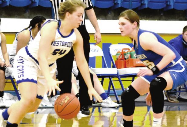 (Photo left) Swiftettes Jaden Pigg on defense for Nazareth in the state semi-finals game.