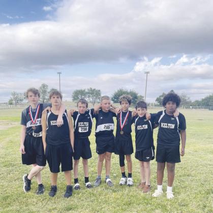 (l) Dillion Brown placed 8th and Brenner Brittian placed 9th in the JH Division. (r) JH boys placed 3rd as a team.