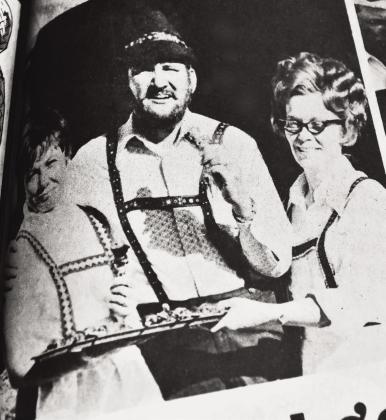 HELPED GET IT GOINGThe late Don Nelson, center, former editor/publisher of the Castro County News, is shown clad in Tyrolean Hat and folk clothing at center in this photo from the initial Nazareth German Folk Festival in 1973 in company with lovely Nazareth ladies. Nelson pushed the original concept of the German Fest in Nazareth.