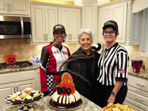 La Madre Mia hostesses for their recent Halloween party and sealed bid auction pictured left to right are: Kathie Kerr, Judy Williams and Teresa Allen. (BRAND Photo By Angela Blackmon)