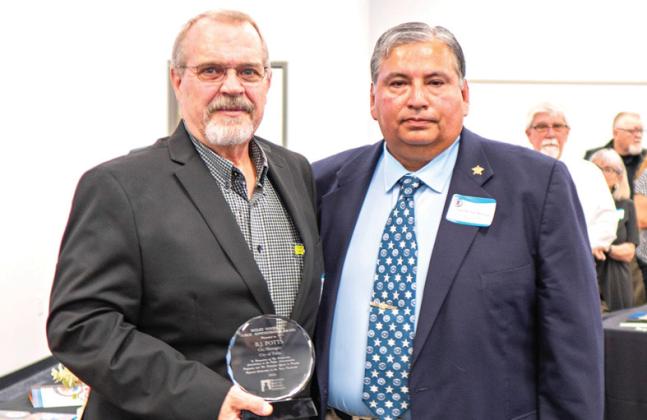 As one of his last duties as PRPC Chairman of the Board of Directors, Castro County Sal Rivera presented former Dimmitt city manager BJ Potts (now Tulia city manager) with the Beelee Goodwin Award at the 2024 PRPC Annual Meeting and Banquet held at the First Responders Academyon Sept. 26 in Amarillo. Rivera will continue to serve on the PRPC Executive Board.