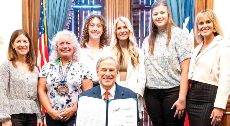 Abbott signs women’s sports act