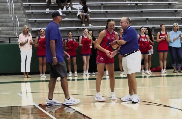Nazareth’s Kambri Cleavinger played in the Texas Girls Coaches Association All-Star Game Friday, July 17. Left, Cleavinger (44) is pictured with Riley Segura (1) of Panhandle and Joie Read (40) of Dalhart. Top, right, Kambri receives the patch the players get for being an All-Star, with her coach right behind her. Also pictured is the Cleavinger’s team as well as Cleavinger playing in the contest. (Courtesy photos)