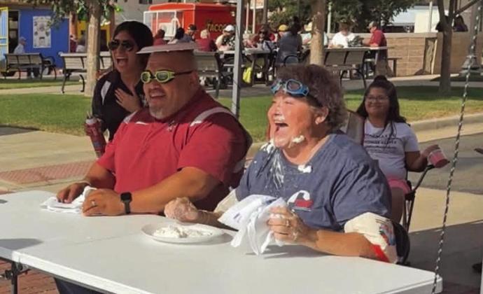 Tulia High School Assistant Principal Robert Vasquez and Tulia High School Principal Lynett Walker covered in Pie