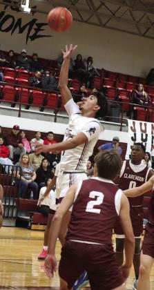Logan Becerra goes in for a layup