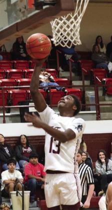 Za’Brien Frost goes in for a layup
