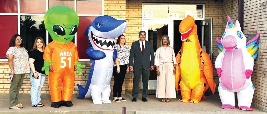 The first day of school saw students greeted by the new superintendent, Juan Dominguez, and other members of the HISD administrative staff – as well as some other bright creatures to spice up the first day.