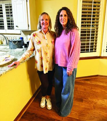 La Madre Mia hostesses for their recent meeting at Cherry Laws’ home on January 22: (left to right) Cherry Laws and Angela Blackmon. (Photo By Angela Blackmon)