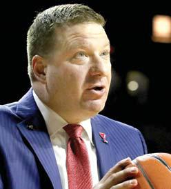 UT basketball coach suspended following arrest