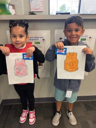 Camilla Silva and Harlem Aleman (K-2nd top boy and girl winners)