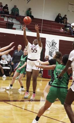 Faith Adams shoots for two