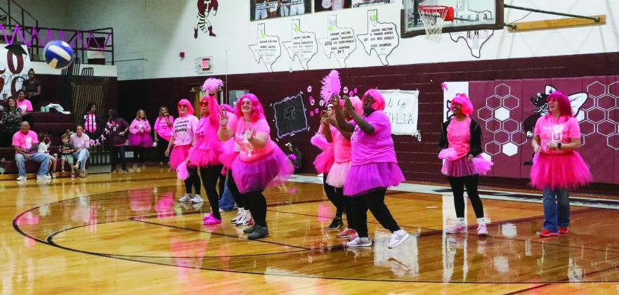 Varsity Volleyball Moms helped with warm-up before the game