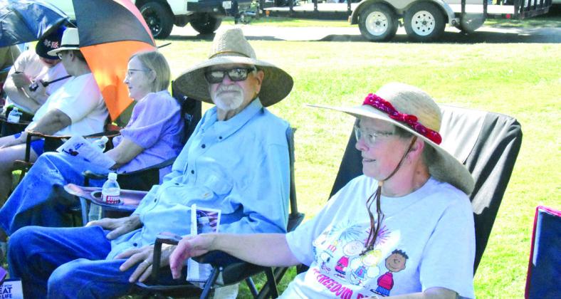 Those attending the 250 Years of Religious Freedom combined service in Dameron Park Sunday, June 28 including John and Nancy Jacobs, brought lawn chairs and sought out places in the shade to hear the message.