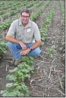 MAKING THE CHANGEBarry Evans of Kress in Swisher County, a cotton and grain sorghum producer, has proved a man ahead of his time, steadily transitioning to dryland farming from irrigated farming in recent years. (Photo by Jim Steiert)