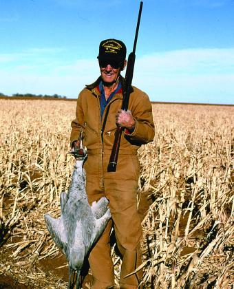 A KIND MENTOR--The author learned some lessons in questing after and bagging sandhill cranes from a kind mentor, the late Royce Teaff of Bula, who put his classic folk art sandhill cranes to work to good effect in fields he had scouted. (Photo by Jim Steiert)