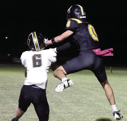 Mason Wolf intercepts the ball to prevent a touchdown