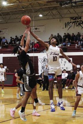 CJ Parker and Gavin Mahannah battle for the rebound