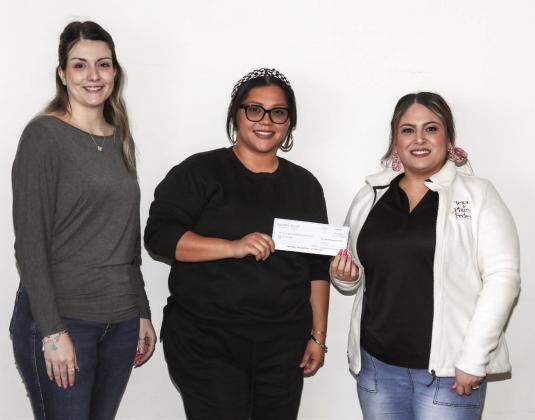 Texas Plains Federal is proud to give our members an opportunity to give back to the community. When you swipe your Community Debit Card on a signature (credit) transaction, we’ll donate a percentage to a charitable organization at no cost to you! Proceeds from the Community Debit were presented to the Youth Athletics Program of Tulia. Krystal Macias accepted the donation from Kawliga Height and April Garza.