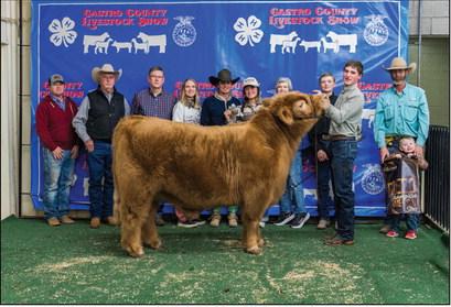 Jack Lunsford is pictured with his Breed Champion American Market Steer at this year’s Castro County Junior Livestock Show.