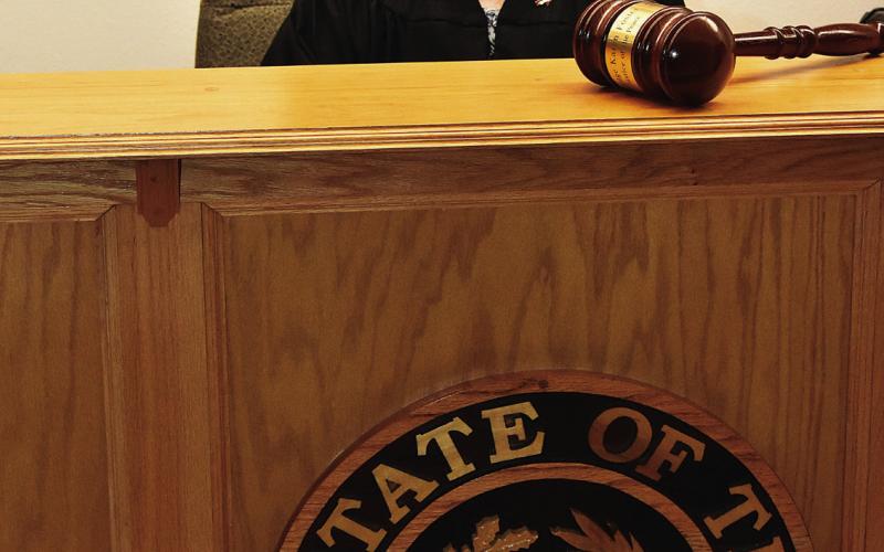 LAYING DOWN THE BIG GAVEL--Karen Boren is retiring from office as Justice of the Peace for Deaf Smith County effective Tuesday, March 31 and will be honored with a reception from 1:30 to 3:30 p.m. that day on the third floor of the Deaf Smith County Courthouse. Mrs. Boren, the lady of the law north and south of the Tierra Blanca, has served just under 41 years in law enforcement and as a JP in Deaf Smith County. (Photo by Jim Steiert)