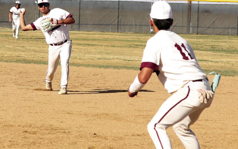 David Abeyta makes the stop and throws the ball to 1st for the out