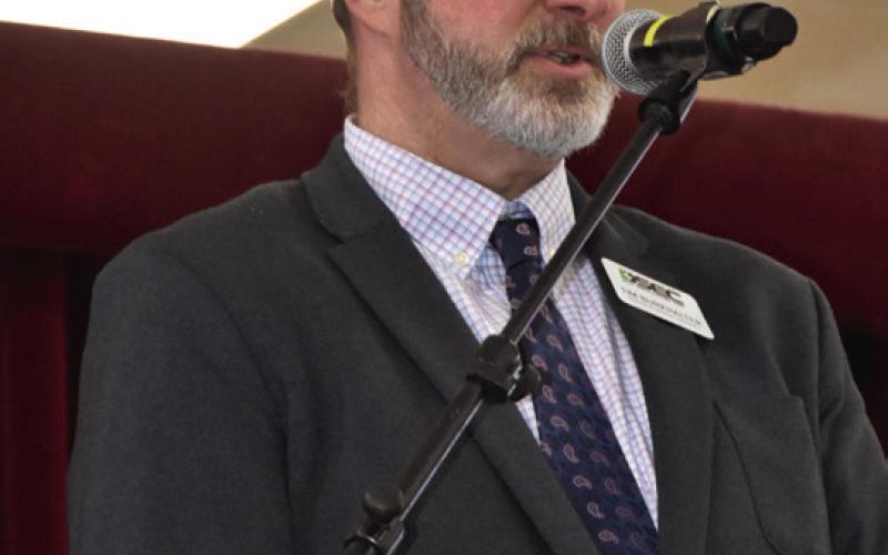 DELIVERING A GOOD WORD--Deaf Smith Electric Cooperative President and General Manager Tim Burkhalter outlined operations of the cooperative in 2025 and entering 2026 at the 88th annual Membership Meeting March 24 at the Hereford Bull Barn. He reported that DSEC continues its growth with the total utility plant in service growing by about $4.5 million in 2025.