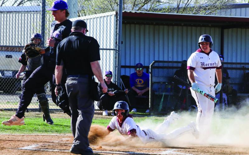 Jacob Trevino slides in safe for the score