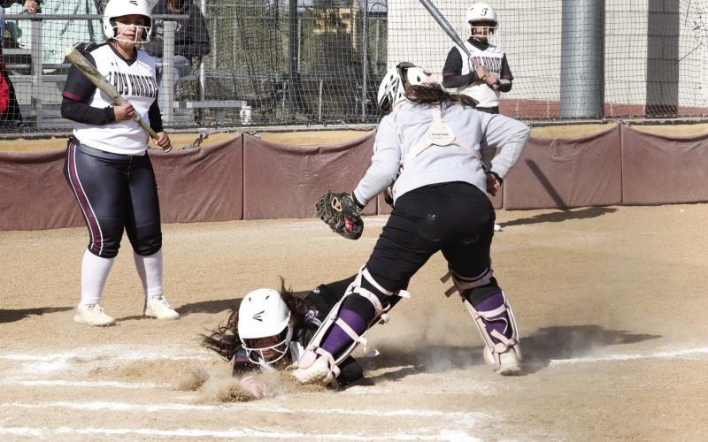 Mariah Briones steals home.