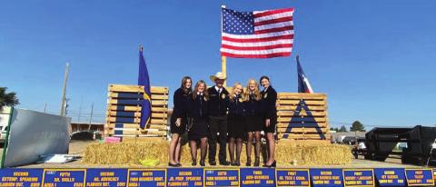 (top photo) Dimmitt FFA got the Harvest Days Parade off in a grand style with a tribute to the farmers of America and FFA.