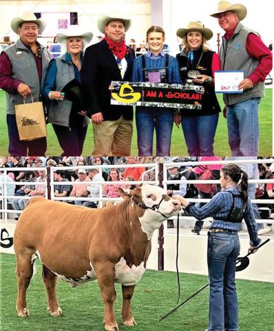 Nazareth FFA Harper Johnson won Breed Champion Red Cross at the San Antonio Livestock Show, made the sale and won a $10,000 scholarship