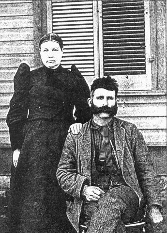 Charles and Katherine Harlan photo in front of first county courthouse, Dimmitt.