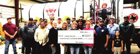 The Dimmitt Pink Ladies presented a check for $14,614 to the Dimmitt VFD following another successful chili cookooff benefit and DVFD golf tourney.