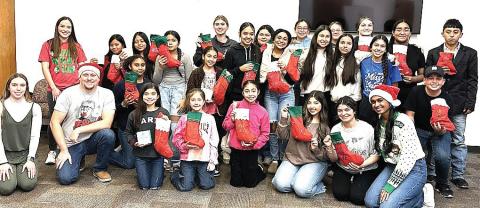 This past Sunday, the Texas Tech pediatric doctors met with Hart High School students to discuss the value of staying in school and not giving up hope. Students got to stuff a stocking to take home, and create gift baskets for some elderly residents of Hart and delivered them.