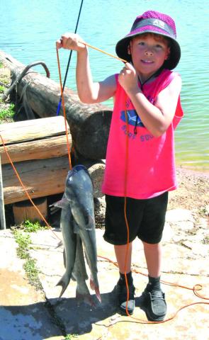 DON'T YA' LOVE FISHING?-What kid of any age wouldn't want to catch a nice stringer of channel catfish like these? The latest opportunity is upcoming Saturday morning at Josserand Aquatic Park Pond in the Fall installment of the Texas Junior Anglers program locally. (Photo by Jim Steiert)