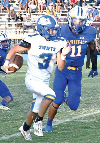 Nazareth Swifts freshman Zane Schulte avoids the Whiteface defense on a run on Friday night.