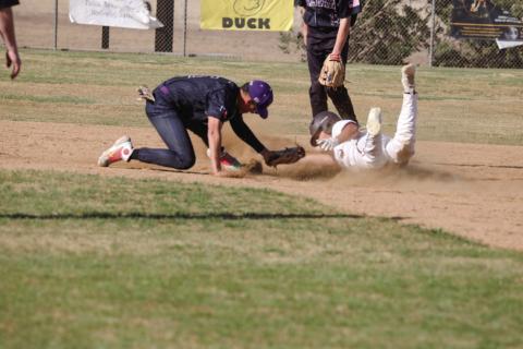 Reynoldo Guerrero avoids the tag at 2nd and slides in safe