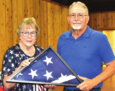 Nazareth Post 528 Commander Clyde Schulte and Angie Milton of the American Legion Auxiliary presented an encased wall hanging flag to the family of William C. “Junior” Hochstein.
