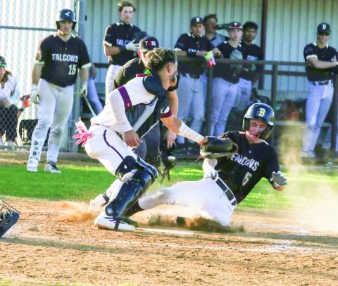 Jarvis Pastrana tags the runner out at home
