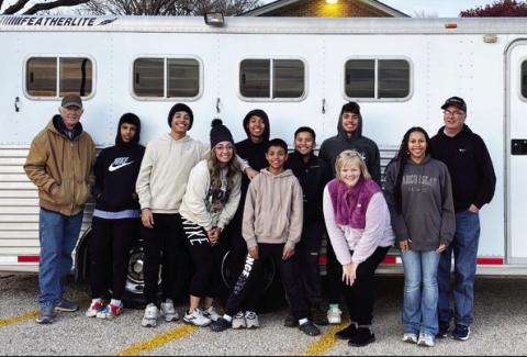 The Cantrell Family with volunteers from Dimmitt loading a trailer for delivery.