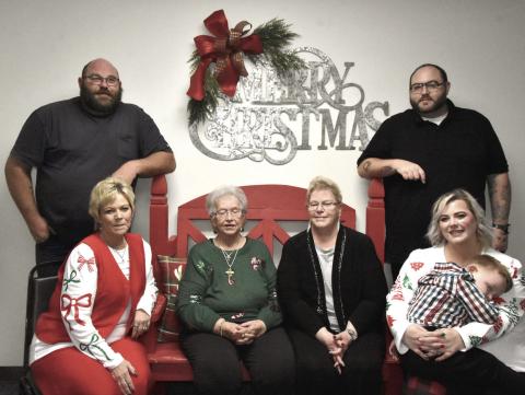 MARKING A MILESTONE—Members of the family of Mary Ann Resch-Fowler, who played a big role in getting the annual event started, gathered with her at the holiday meal during the 35th edition of the Festival of Trees at the Hereford Senior Citizens Center. Pictured from let are David O’Neal, Deana Grissom, Mary Ann Resch-Fowler, Debbie Wait, Rebecca Grissom, Elliott Sowell, and Bobby O’Neal. Many in the company were small children when the first Festival was held in 1990. (Photo by Jim Steiert)