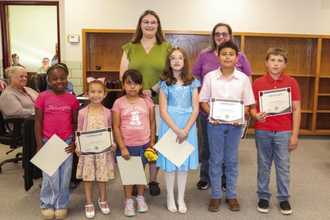 Tulia Elementary School Recognitions Back Row: Mikayla Adams, and Lori DeFries Front Row: London Session, Harper Pastrana, Alexa Bustos, Isadora Gatlin, Martin Delgado,