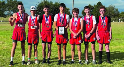 The FEHS Boys cross country team earned 2nd place and are headed to regionals! Congratulations &amp; Good Luck! Kelton Sims - 2nd place, Tristan Trout-4th place, Tazlan Brown-6th place Haze Ehmann-9th place. Pictured (l to r): Kelton Sims, Tristan Trout, Haze Ehmann, Tazlan Brown, Jaxon Meadows, Tanner Horn, Ian Walker. (Courtesy Photo)