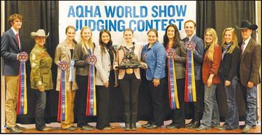 The West Texas A&amp;M University horse judging team recently won two major championships, including the National Reining Championship. Pictured are team members Trenton Hammerand,National Reining Horse Association representative Patti Carter, Lauryn Harris, Jennica Dannehl, Shanna Marquart, Anna Wilhelm, Anya Katz, Jillian Melendez, Marty Kacsh, Makenzie Knipe, Maggie Murphy and Coach John Pipkin. (Photo provided by WTAMU)
