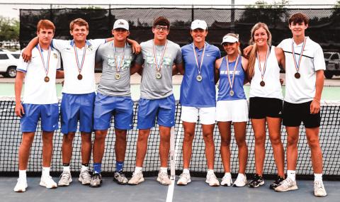 (Photo right) Nazareth Tennis Team members at Regional Meet – Chance Hochstein (Sr), Tye Schulte (Sr), Luke Betzen (Sr), Trent Gerber (Jr), Carson Heiman (So), Harley Gerber (Fr), Iris Schilerink (So) and Luke Schulte (So). (photo by Cynthia Huseman)