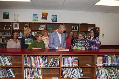 Judge Clawson signed the Child Abuse Prevention Proclamation recognizing April as Child Abuse Prevention Month in Swisher County. Pictured are Lillian Araiza, Sharon Wyatt, Joyce Childers, Nancy House, Judge Michael Clawson, Lisa Hooper, Yvonne Fifer, Lynnett Walker, and Dr. Tori Marnell.