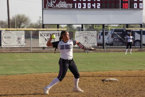 Shortstop Kyla Rodriguez makes the throw to 1st base